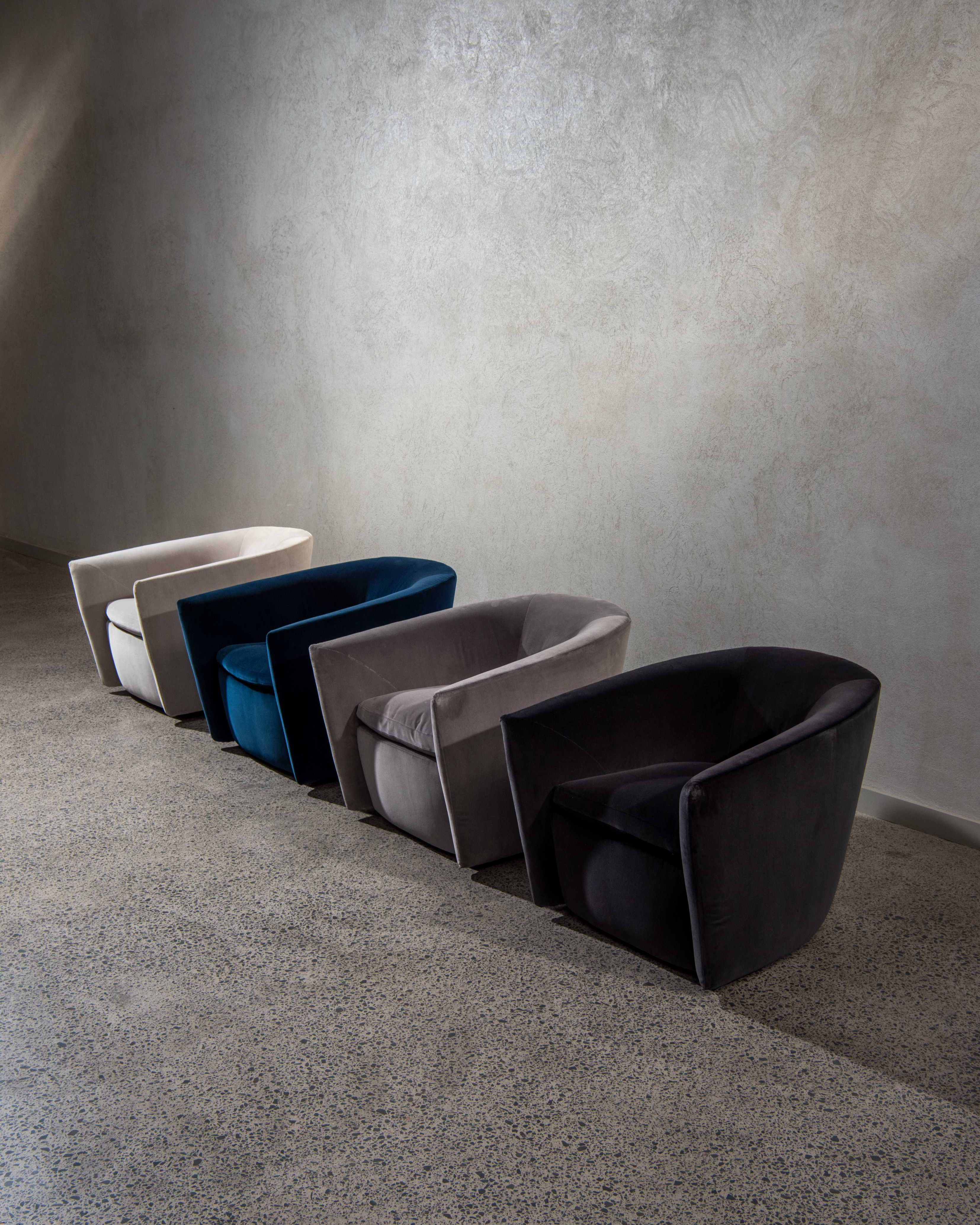 Roma lounge chairs. Four in a row with different colour ways.