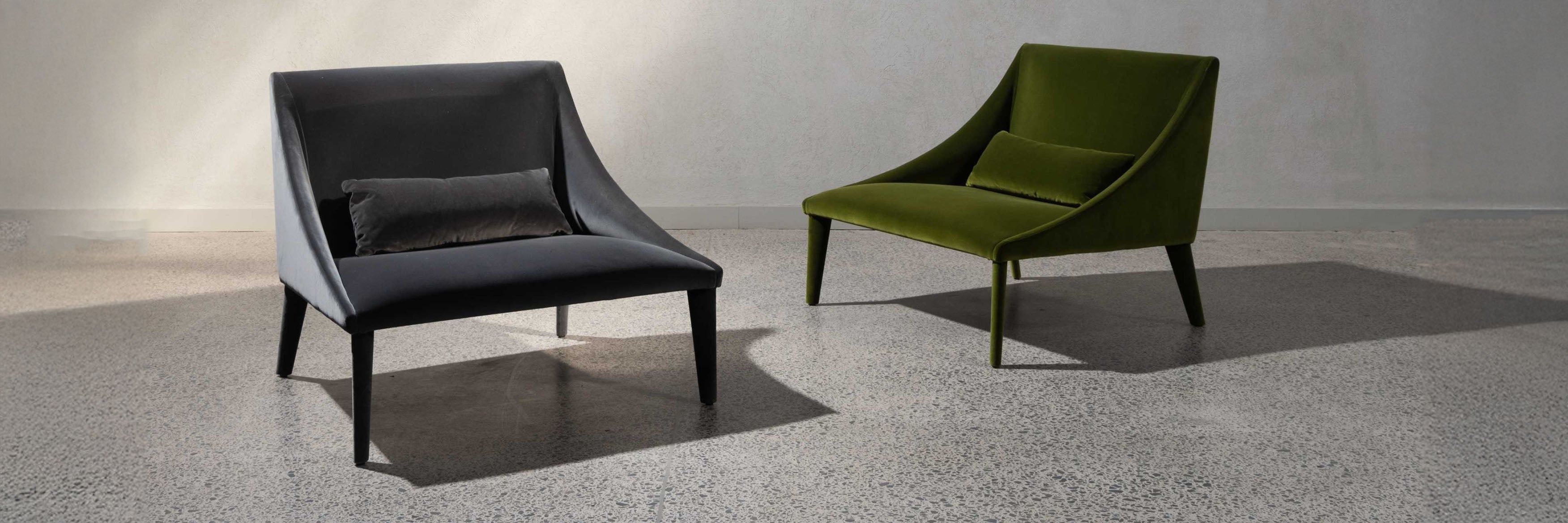 Petalo Italian lounge chairs in showroom. Two models in two colour ways.