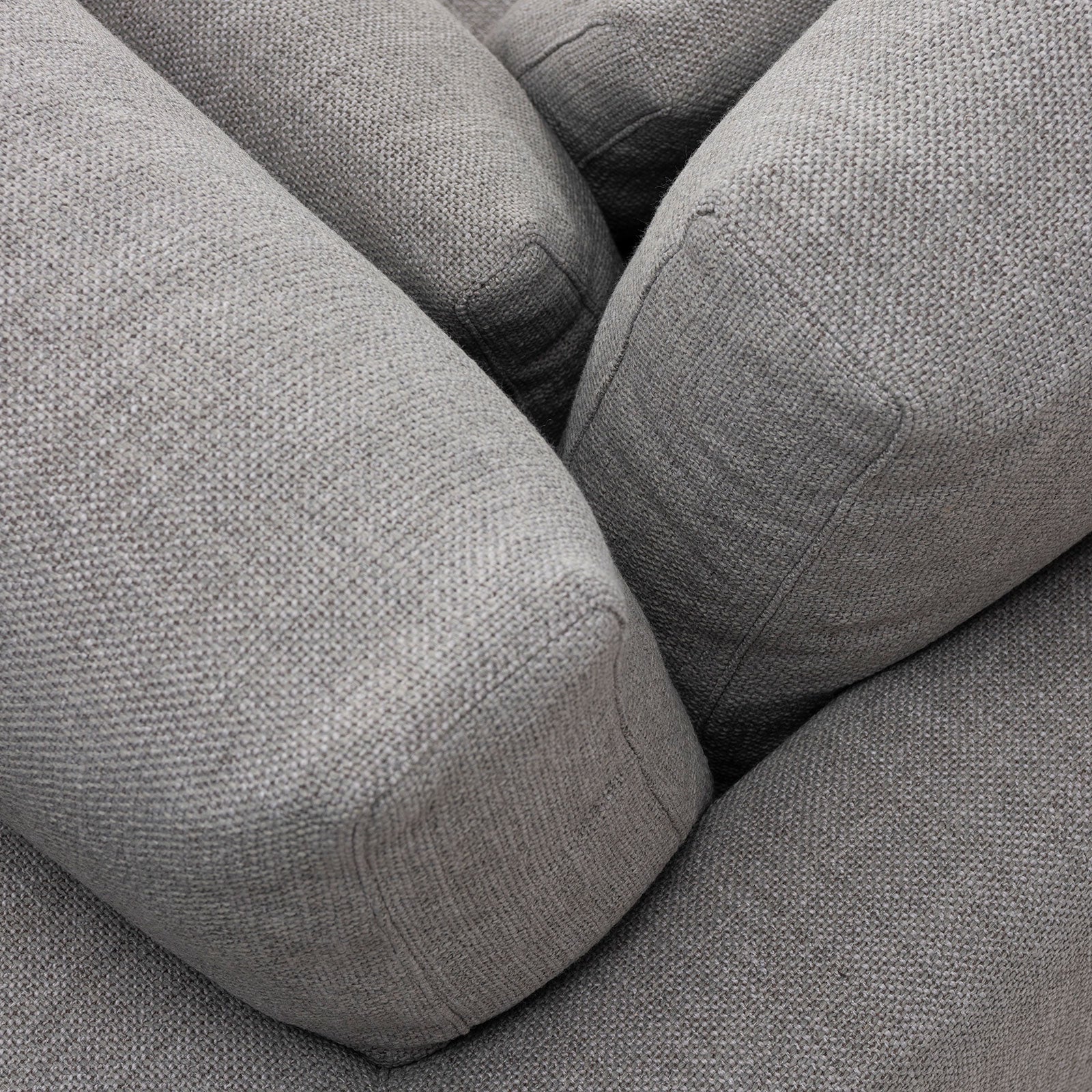 Portofino modular lounge in fog colour. Close up view of cushions.