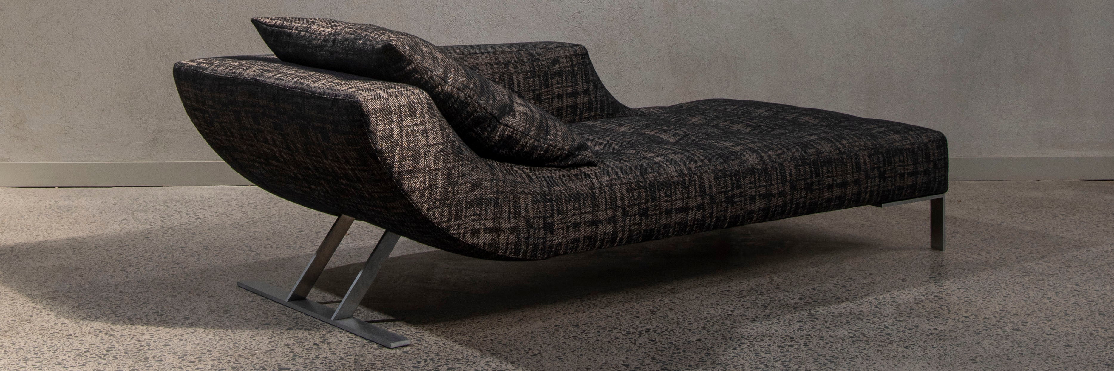 Viceversa Italian chaise longue in showroom. Rear angle view.